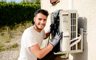 a man servicing an electrical box